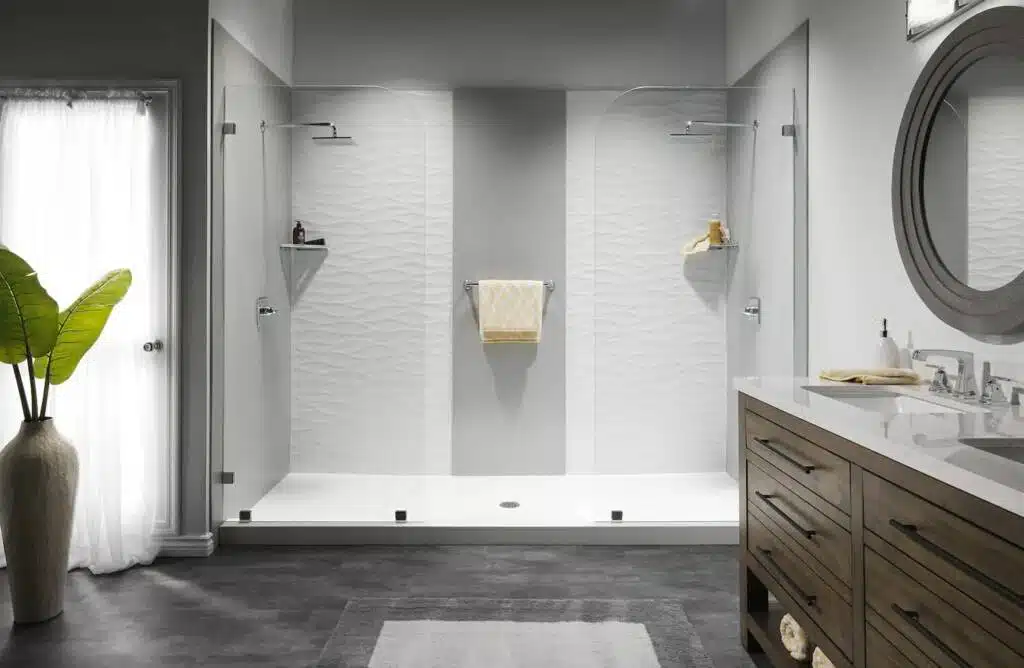 Couples two-person shower with white marble and two shower heads.