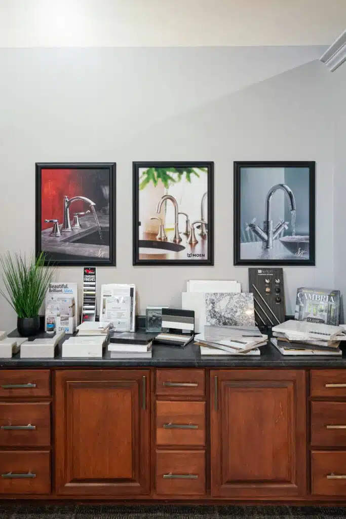 Partner company binders and promotional materials located at Columbus Bath Design's Design Center in Lewis Center, Ohio.